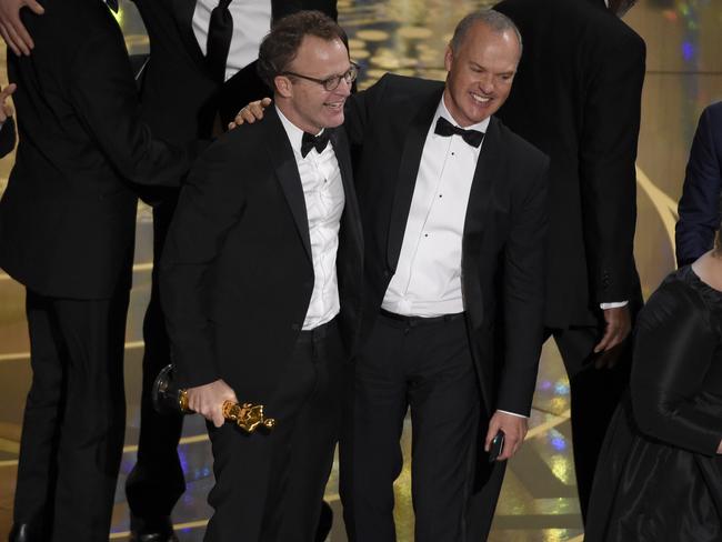 Michael Keaton accepts the award for best picture for <i>Spotlight.</i>