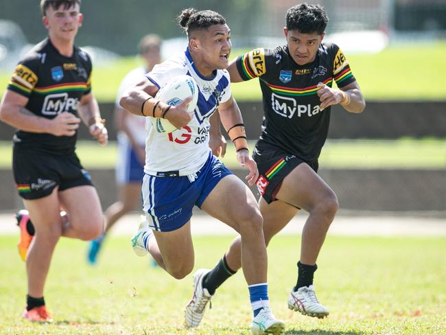 17/02/2024. News Local. Sport. Windsor, Sydney, NSW, Australia.NSWRL Junior Reps, Harold Matthews Cup round three, Penrith Panthers  v Canterbury Bankstown Bulldogs at Windsor Sports Complex, Windsor, 17 February 2024Bulldogs won the game 46-10Pic shows:Panthers player: Bulldogs player:  Tawa-Dean Simpkins breaks the defencePicture: Julian Andrews