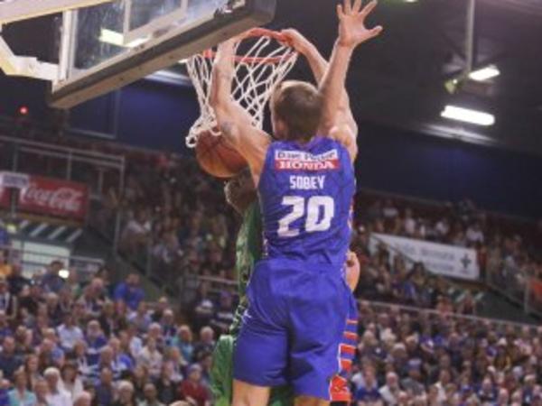 Adelaide 36ers Nathan Sobey dunking against the Townsville Crocs at Adelaide Arena . Source Twitter