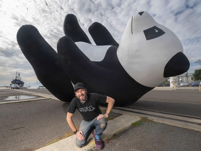 A Blanck Canvas director Joe Blanck with one of its inflatable pandas during test run for its Light Creatures display at Adelaide Zoo. Picture: Rob Leeson.