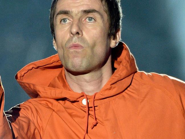 In this Sunday, June 4, 2017, handout photo provided by Dave Hogan for One Love Manchester, singer Liam Gallagher performs at the One Love Manchester tribute concert in Manchester, north western England, Sunday, June 4, 2017. One Love Manchester is raising money for those affected by the bombing at the end of Ariana Grande's concert in Manchester on May 22, 2017. (Dave Hogan via AP)