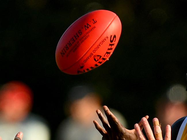 Bassirou Faye of the Stonecats handballs during the 2023 MPFNL Division One Seniors Grand Final match between Dromana and Frankston YCW at Frankston Park in Frankston, Victoria on September 17, 2023. (Photo by Josh Chadwick)