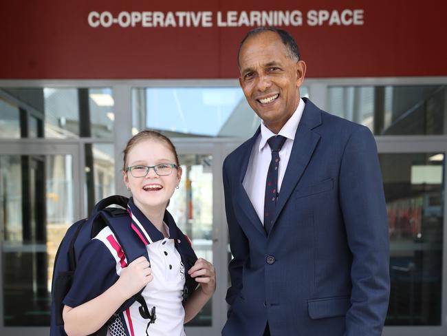 Principal Mark De Vries welcomes Jessica Bollard to the school.