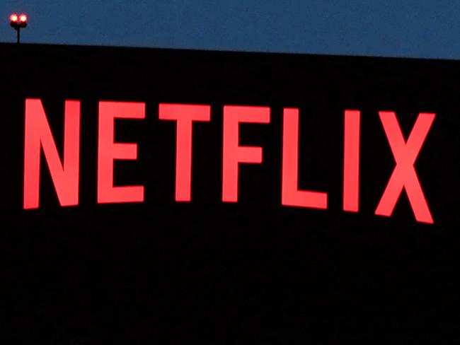 (FILES) The Netflix logo is seen on the Netflix, Inc. building on Sunset Boulevard in Los Angeles, California on October 19, 2021. Netflix on July 19, 2023 said subscriptions to the streaming television service climbed to more than 238 million in the wake of its crackdown on password sharing. Netflix finished the recently ended quarter with an addition 5.9 million subscribers and a profit of $1.5 billion, according to an earnings release. (Photo by Robyn Beck / AFP)