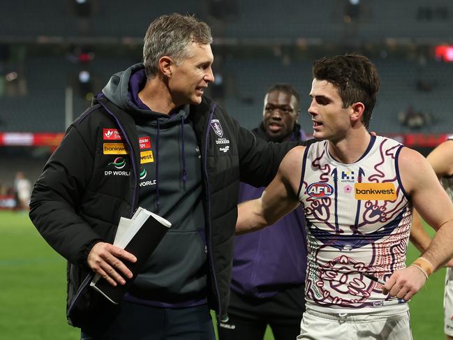 Justin Longmuir speaks with Andy Brayshaw after the club’s win over St Kilda in Round 10. Longmuir says he values his relationships with his players. Picture: Robert Cianflone/Getty Images.