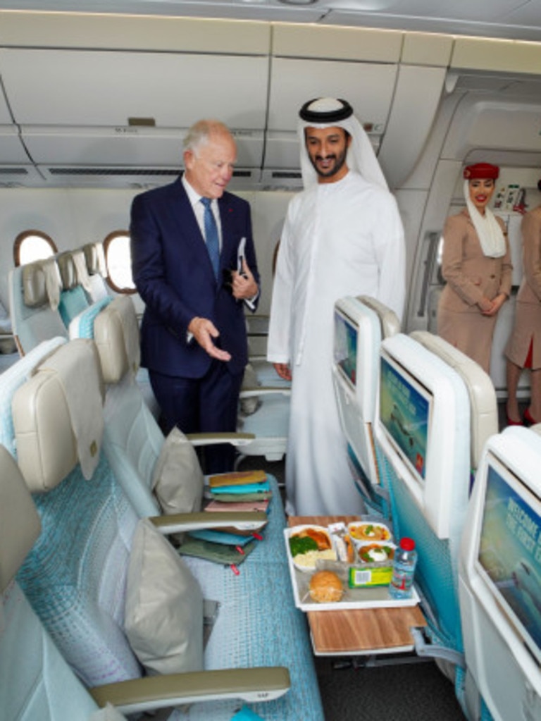 The duo taking a look at economy class. Picture: Emirates