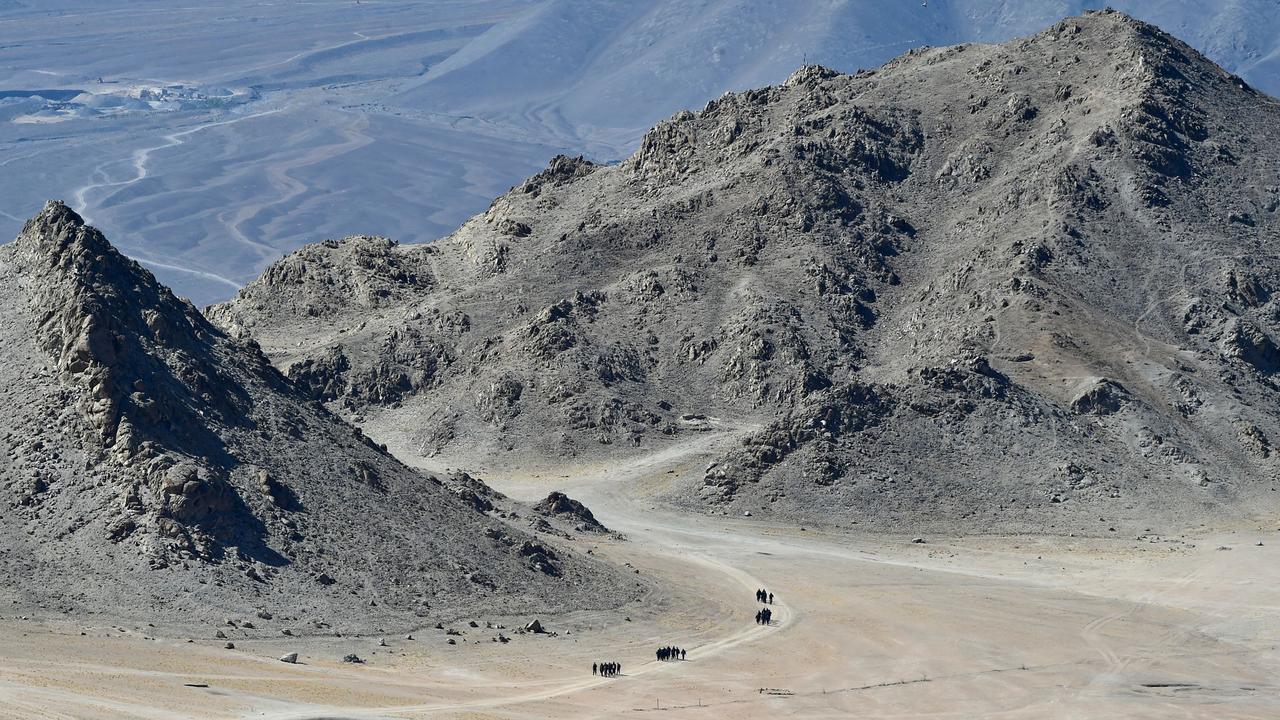 Indian soldiers walk at the foothills of a mountain range near Leh. Picture: Tauseef Mustafa/ AFP