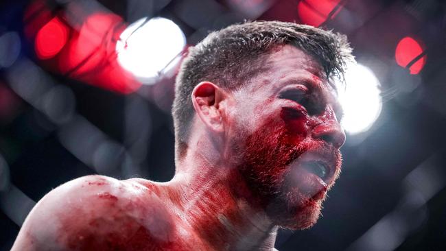 Jim Miller looks on against Bobby Green. Carmen Mandato/Getty Images/AFP