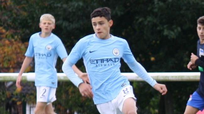 Alex Robertson in action for City.