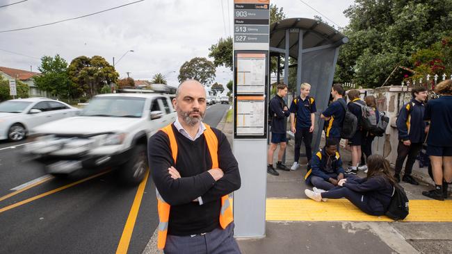 Coburg High School assistant principal Gary Vella at a dangerous bus stop at the corner of Bell and Belgrave streets. Picture: Jason Edwards