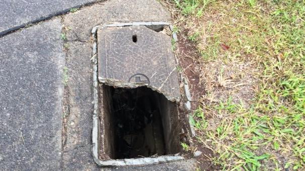 A broken Telstra cover on Cliveden Ave, Corinda (now repaired). Labor says the Council administration has been repairing, not replacing or properly fixing, hundreds of kilometres of footpaths.