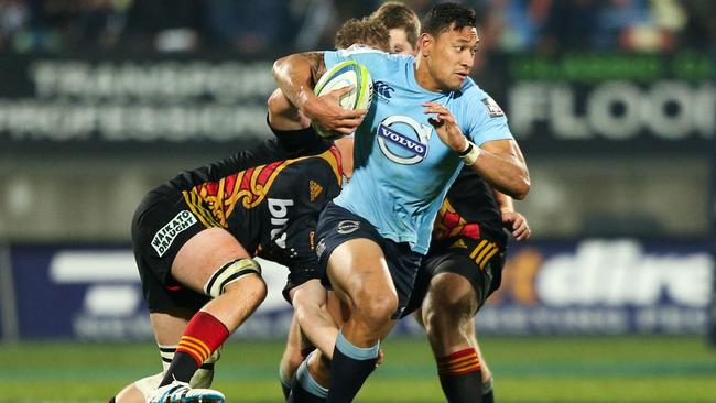 NEW PLYMOUTH, NEW ZEALAND - MAY 31: Israel Folau of the Waratahs makes a break during the round 16 Super Rugby match between the Chiefs and the Waratahs at Yarrow Stadium on May 31, 2014 in New Plymouth, New Zealand. (Photo by Hagen Hopkins/Getty Images)