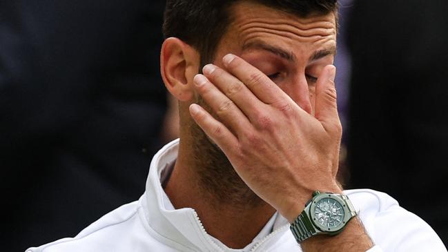 Novak Djokovic reacts to his defeat by Spain's Carlos Alcaraz at Wimbledon