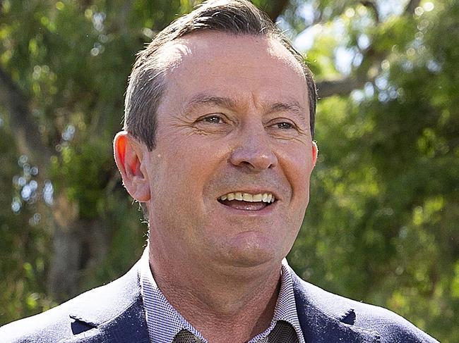 PERTH, AUSTRALIA - MARCH 14: Premier elect Mark McGowan speaks to the media surrounded by his family at the foreshore in Rockingham on March 14, 2021 in Perth, Australia. Labor leader Mark McGowan has won the West Australian state election for a second term, in a landslide victory. (Photo by Will Russell/Getty Images)