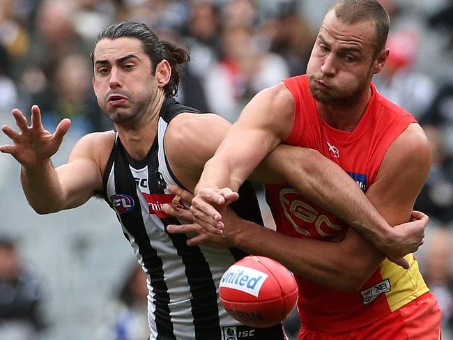 Collingwood’s Brodie Grundy contests the ruck against Gold Coast’s Jarrod Witts during the round 20 AFL match between the Magpies and Suns at the MCG on August 4, 2019. Picture: AAP