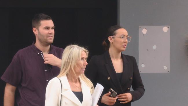Abigail Lillian Donne, 21, (in black with glasses) leaving Wyong Local Court with her mum and brother after pleading guilty to high range drink-driving after running into a house. Picture: NewsLocal