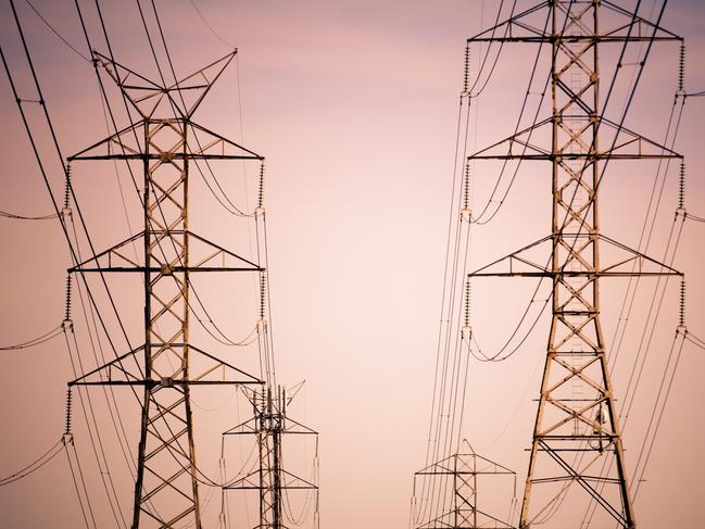 Massive power lines stretch into the distance