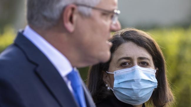 NSW Premier Gladys Berejiklian looks on as Scott Morrison speaks during a press conference at Kirribilli House in Sydney on Tuesday. Picture: Getty Images