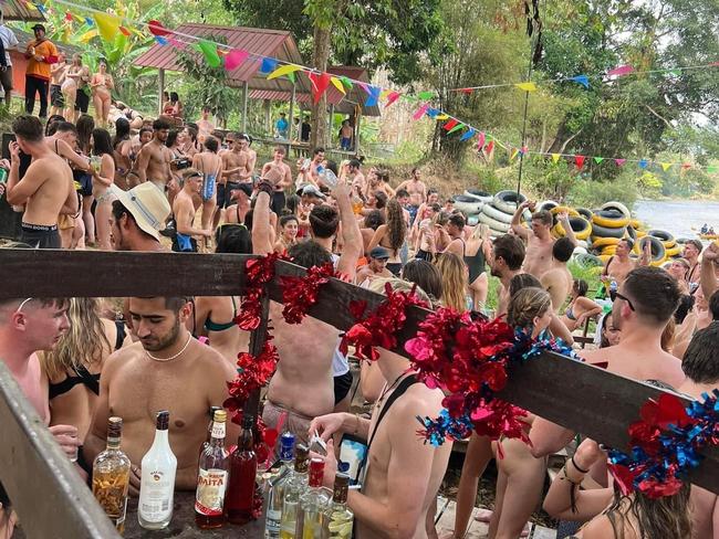 Backpackers at the Nakee Bar on the banks of the Nam Song River in Vang Vieng, Laos. Picture: Supplied