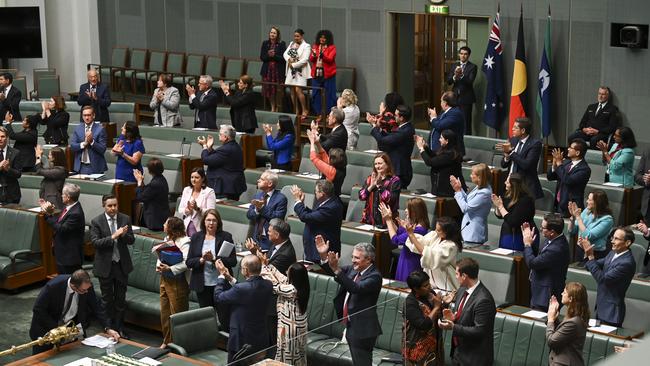 Labor MPs following the reading of the Constitution Alteration (Aboriginal and Torres Strait Islander Voice) 2023 is introduced to the house of representatives on March 30, 2023 in Canberra, Australia.