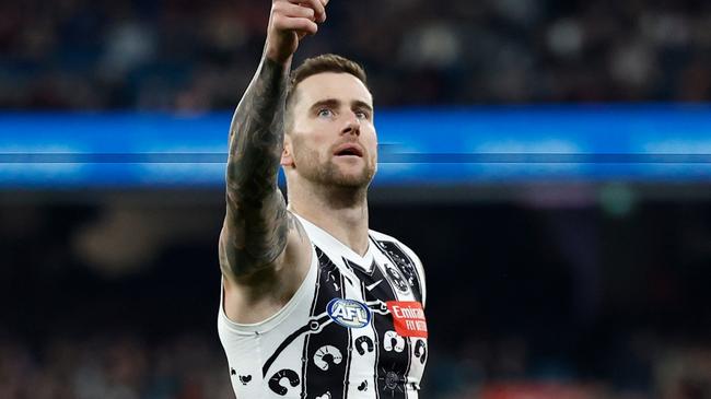 MELBOURNE, AUSTRALIA - JULY 05: Jeremy Howe of the Magpies celebrates a goal during the 2024 AFL Round 17 match between the Collingwood Magpies and the Essendon Bombers at Melbourne Cricket Ground on July 05, 2024 in Melbourne, Australia. (Photo by Michael Willson/AFL Photos via Getty Images)