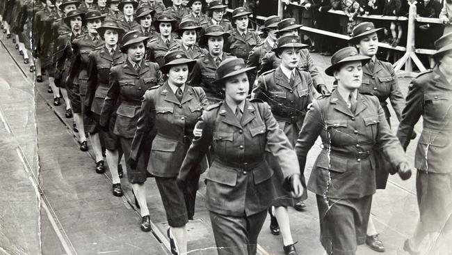 Catherine Erickson served in WWII as part of the Women’s Army Corps based in Melbourne (pictured marching front right). Picture: Supplied.