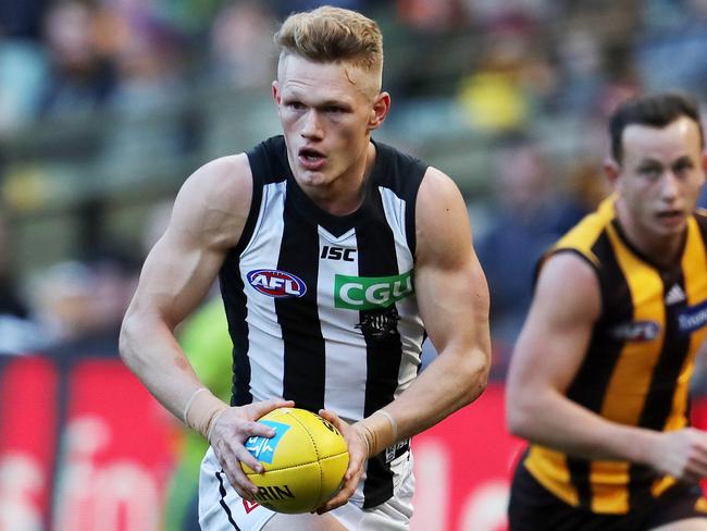 AFL Round 15. Hawthorn vs. Collingwood at the MCG. Collingwood's Adam Treloar runs forward   . Pic: Michael Klein