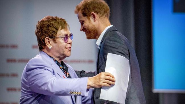 Prince Harry, right, and Sir Elton John. Picture: Robin Utrecht/AFP