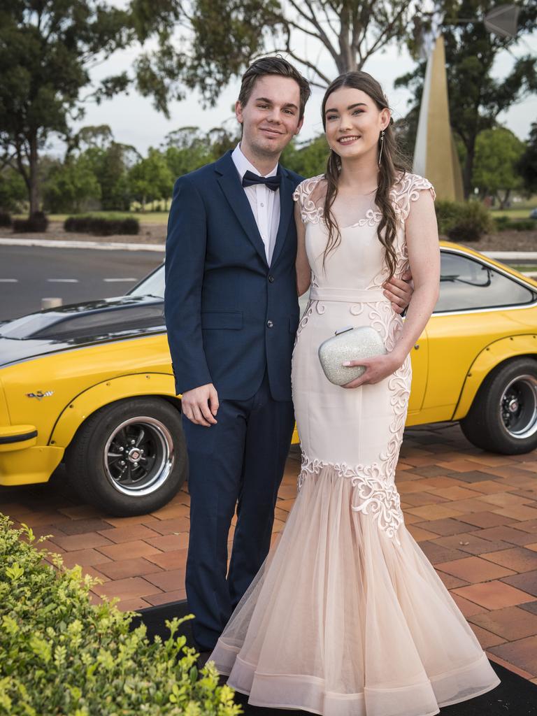 Jaden McIntosh partners Zoey Tanzer to her Wilsonton State High School formal arrivals at USQ, Wednesday, November 18, 2020. Picture: Kevin Farmer