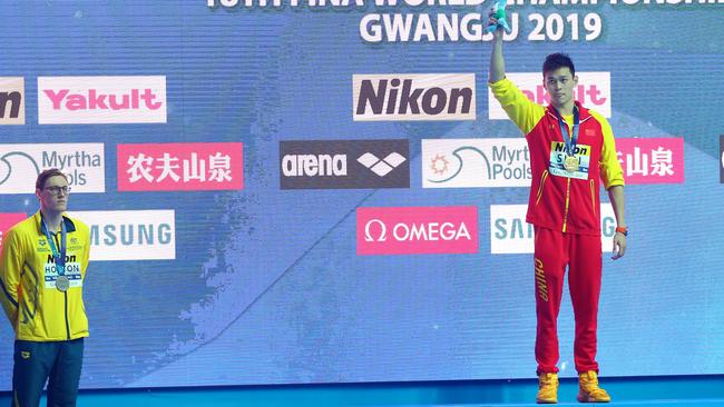 Silver medallist Mack Horton of Australia refuses to share the podium with gold medallist Sun Yang of China during the medal ceremony for Men's 400m Freestyle Final at the FINA World Championships. Picture: Maddie Meyer/Getty Images