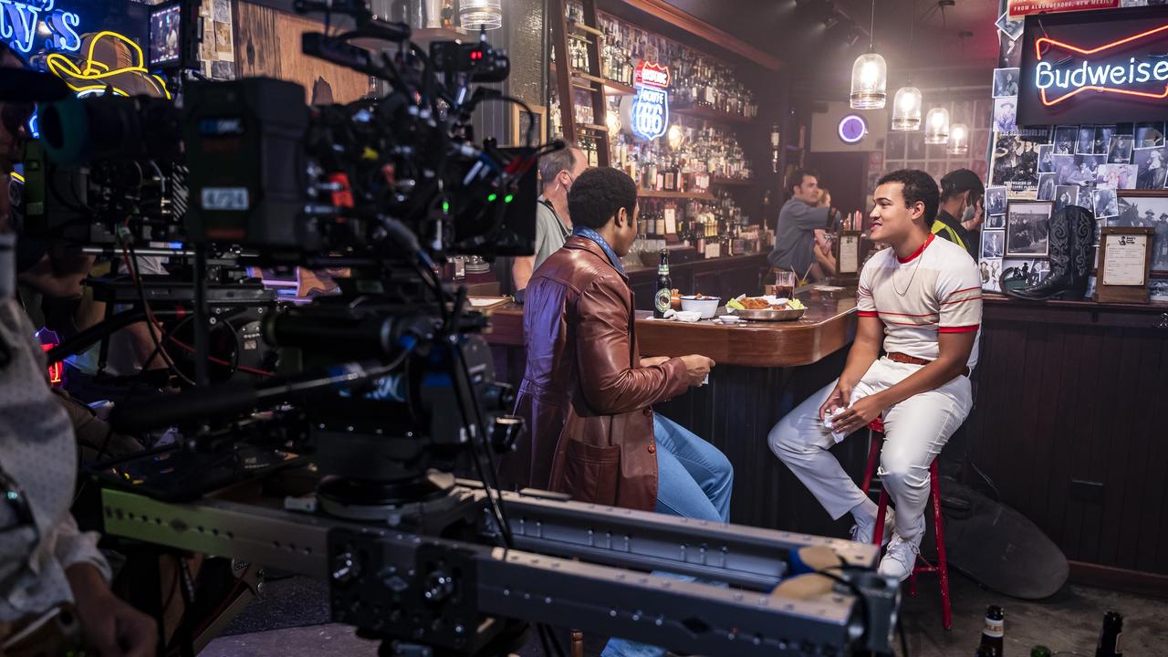 Joseph Anderson and Bradley Constant filming on the Gold Coast for Young Rock season two episode 1. Photo: Mark Taylor/NBC