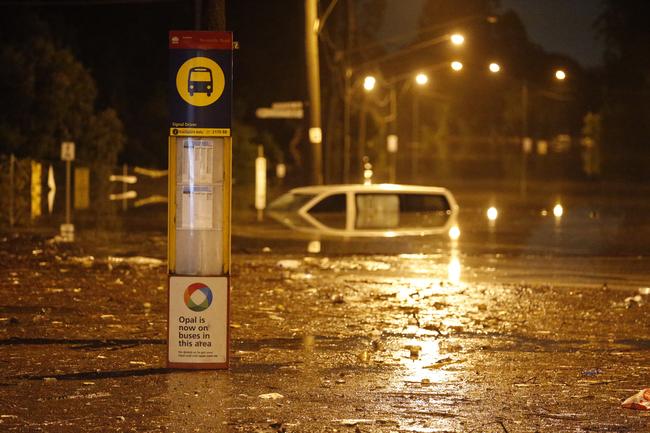 A van heavily submerged in flood waters on the corner of Riverside and Newbridge roads in Chipping Norton.