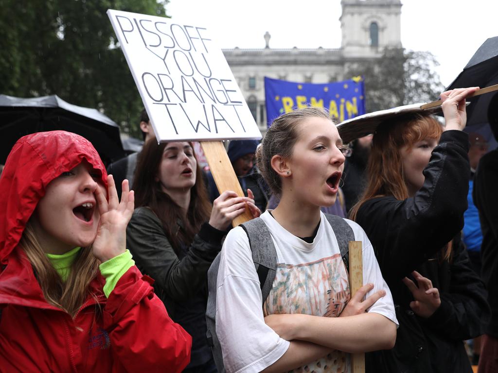 Protesters braved the rain at Parliament Square as Mr Trump and First Lady Melania Trump visited 10 Downing Street for business meetings with the Prime Minister. Picture: Dan Kitwood/Getty Images