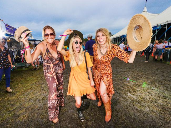 Vanessa Rowe, 38, Sarah Hadziomerovic, 27, and Suzanne Anderson, 38, having a ball at Bluesfest. Picture: NIGEL HALLETT