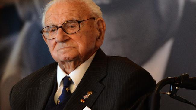 (FILES) A picture taken on October 28, 2014 shows Sir Nicholas Winton receiving the Order of the White Lion at Prague Castle during the celebration of the Independance day. Nicholas Winton, a Briton who saved hundreds of Jewish children in Prague from the Nazis in the run-up to World War II, has died at the age of 106, his family said on July 1, 2015. AFP PHOTO / MICHAL CIZEK