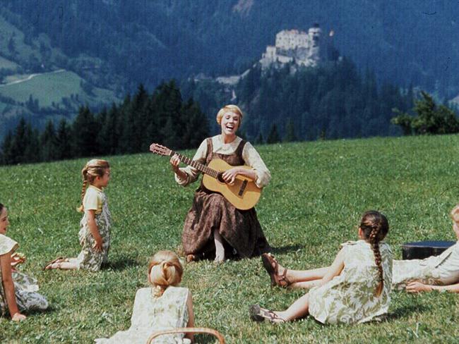 Andrews with some of the children in scene from The Sound of Music. Picture: Supplied