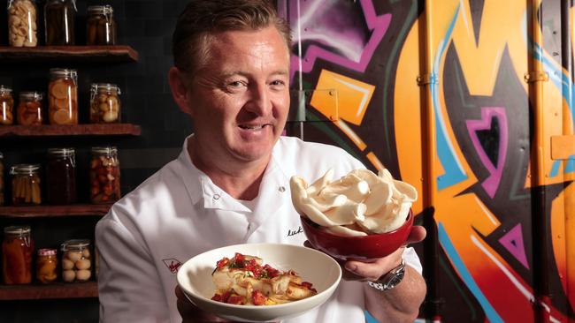 Virgin Australia consultant chef Luke Mangan with a dish of Chicken and Oyster Mushrooms inspired by a partnership with a mushroom growing firm Fungimentals who collect 150kg of coffee grounds which then become 30kg of oyster mushrooms six weeks later. Photographed at his Waterloo restaurant Mojo. Picture: John Fotiadis
