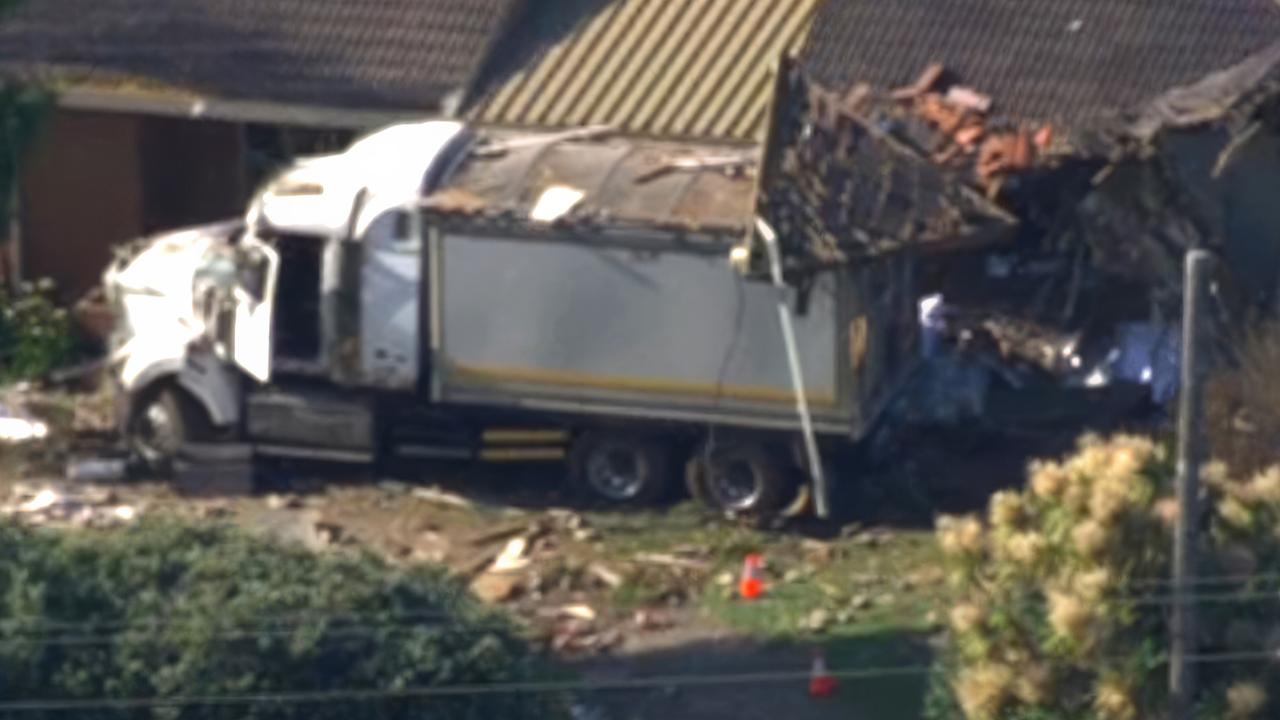 Couple killed as truck crashes into house