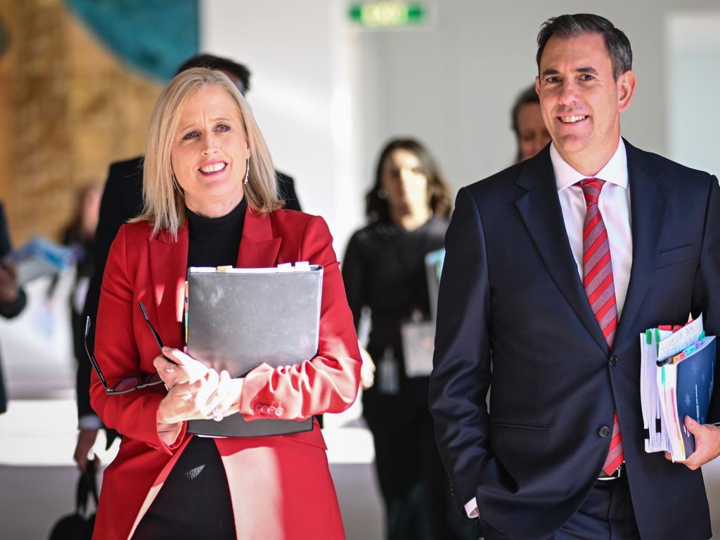Australia's Treasurer Jim Chalmers, right, arrives with Finance Minister Katy Gallagher for the budget lockup at Parliament House in Canberra on May 14. Picture: Tracey Nearmy/Getty Images
