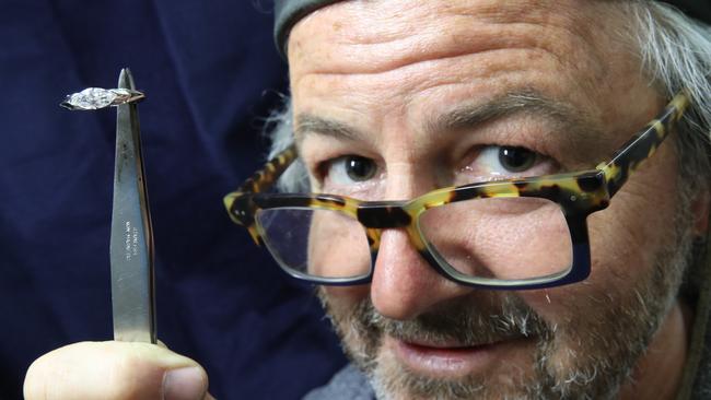 Multi award-winning Gold Coast jeweller Ben Tracy at work at Robina. Ben talks about his role designing and creating David and Victoria Beckham's wedding rings amid the revival of interest in the soccer star with the new Netflix documentary. Picture Glenn Hampson