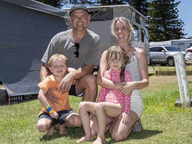 SYDNEY, AUSTRALIA - Daily TelegraphPhotos - Thursday, 26 December 2024:Tim and Sara Mott with their son Artie 6 and niece Riley 6 pose for a photo at Narrabeen Camping Ground.Picture: Daily Telegraph/ Monique Harmer