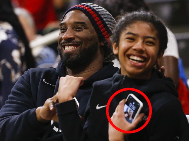 Former NBA star Kobe Bryant attends an NCAA women's college basketball game between Long Beach State and Oregon, Saturday, Dec. 14, 2094 in Long Beach, Calif. The Oregon won 81-45. (AP Photo/Ringo H.W. Chiu)