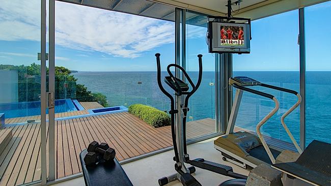 The Dover Heights home of the Miller family has a gym that overlooks the ocean.