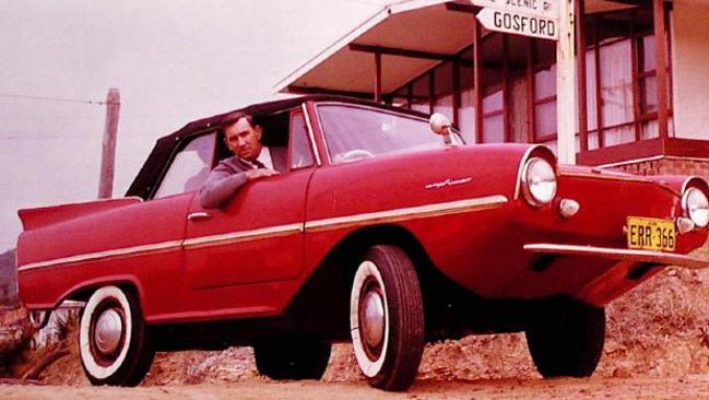 Rod Radford in his Amphicar amphibious car in the 1960s. He used to commute across the entrance to Brisbane Water from his home in Wagstaff to his business in Ettalong, NSW.