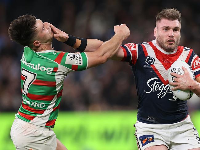 SYDNEY, AUSTRALIA - SEPTEMBER 02:  Angus Crichton of the Roosters fends off Lachlan Ilias of the Rabbitohs during the round 25 NRL match between the Sydney Roosters and the South Sydney Rabbitohs at Allianz Stadium on September 02, 2022, in Sydney, Australia. (Photo by Cameron Spencer/Getty Images)