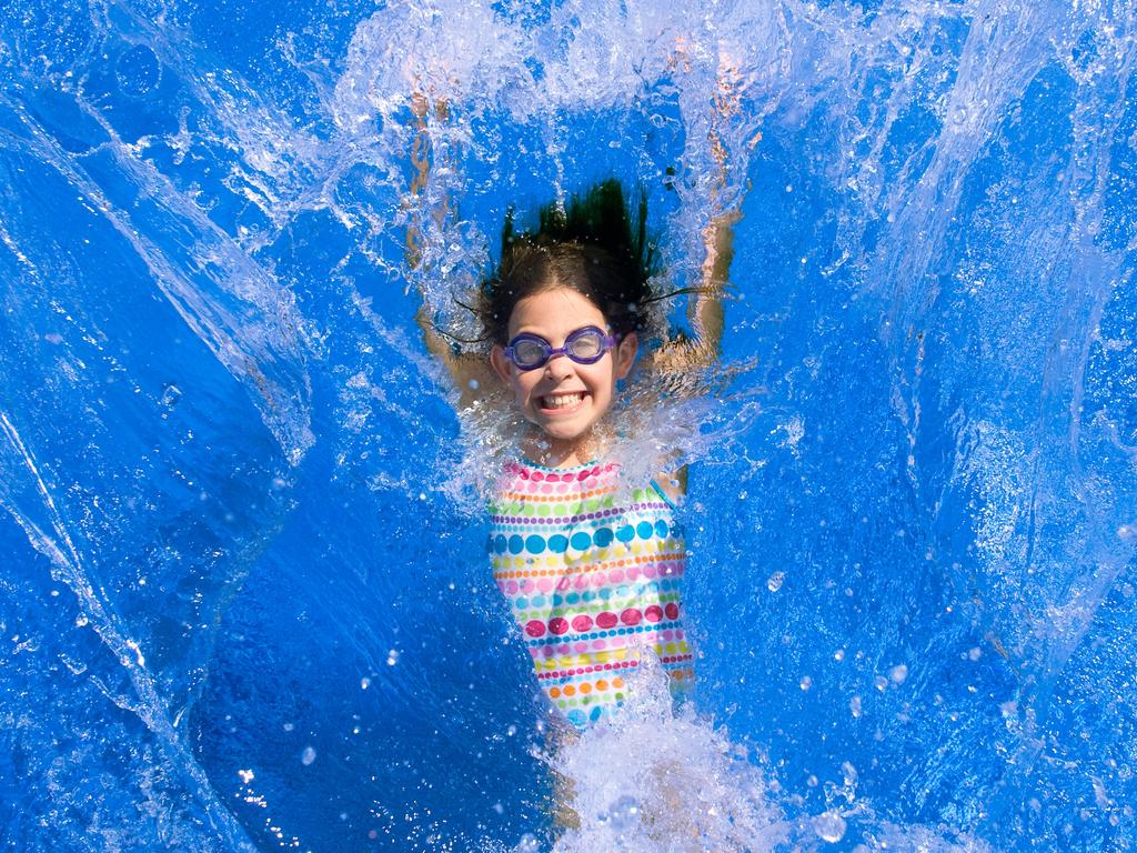 Child falling back into a swimming pool