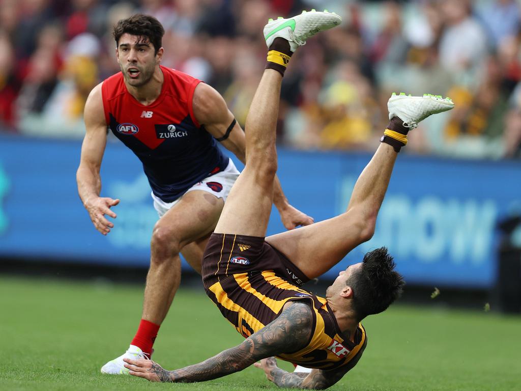 Chad Wingard is up-ended by Christian Petracca. Picture: Michael Klein