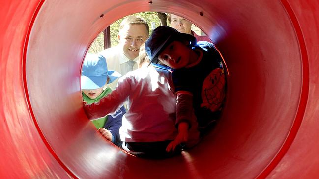 Prime Minister Anthony Albanese — pictured helping open a playground in 2009 — insisted on transparency in Opposition but is playing a different game in government.