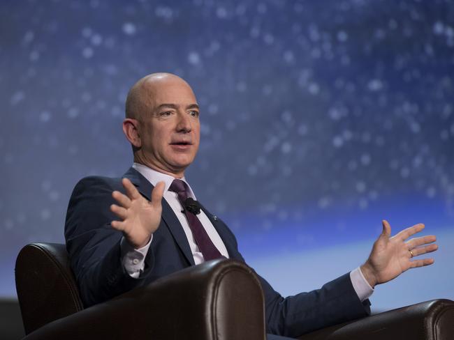 Jeff Bezos, chief executive officer of Amazon.com Inc. and founder of Blue Origin LLC, speaks during the 32nd Space Symposium in Colorado Springs, Colorado, U.S., on Tuesday, April 12, 2016.