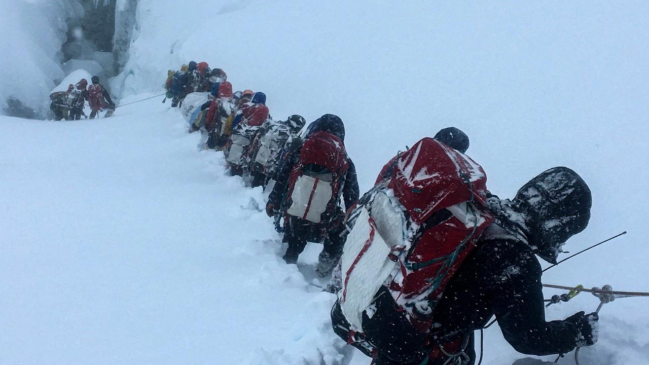 There’s a growing number of people trying to scale Mt Everest, and not making it back down. Picture: Lakpa SHERPA / AFP.